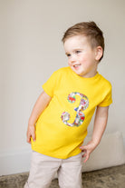 Magnificent Stanley Tee Personalised or Number Yellow T-Shirt in Dinosaur Liberty Print